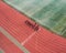 Aerial view of a group of male runners on a sports track