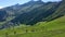 Aerial view of a group of mountain bikers with e-bikes in the swiss alps in Valais canton in sunny weather