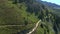 Aerial view of a group of mountain bikers with e-bikes in the swiss alps in Valais canton in sunny weather