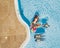 Aerial view of group people having fun together - friends  young tourist women enjoy the pool in summer holiday vacation -