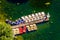 aerial view of a group of rowing boats binded together to a pier...IMAGE