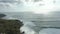 Aerial View Of Group Of Surfers In Ocean In Bali, Indonesia. People Surfboarding.