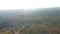 Aerial view of group of windmills on a hill path