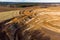 Aerial view of a growing sand pit at the expense of fields