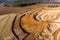 Aerial view of a growing sand pit at the expense of fields