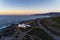 Aerial view of the Guincho area, with the Cabo Raso Lighthouse, the scenic road along the coast and the Roca Cape Cabo da Roca o