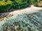 Aerial view of Gunung Payung Secret Beach, Bukit, Bali, Indonesia. Turquoise water, rocks, ocean scenery