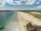 Aerial view on Gurteen bay and beach, county Galway, Ireland. Long stretch of sandy beach and beautiful ocean. Irish landscape.