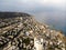 Aerial view on Haifa coastline, Israel, Mount Carmel. Travel background. Scenic panorama of a seaside city at misty sea horizon
