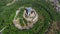 Aerial view of Hambach castle surrounded by dense trees