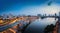 Aerial view of Hanoi cityscape by twilight period, with Da lake and under construction Cat Linh - Ha elevated railway