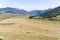 Aerial view of harvested Hay field with mountains in background, Carretera Austral route - Coyhaique, AysÃ©n, Chile