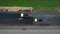 Aerial view of heavy machinery with shipment of fresh asphalt.