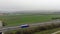 Aerial view of a heavy truck moving on the autobahn