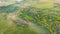 Aerial view height landscape fields and farms horizon, forest village flying birds. Morning fog in the meadows mouth of the river