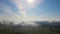 Aerial view from high altitude of landscape covered with puffy morning fog. Cold humid air condensing in rain clouds