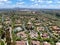 Aerial view of high class neighborhood with big villa in the valley, San Diego