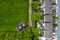 Aerial view on high density living area with houses built close to each other and park. Residential area in Ireland with private