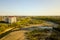 Aerial view of high residential apartment building in green rural area in Ivano-Frankivsk city, Ukraine