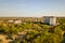 Aerial view of high residential apartment building in green rural area in Ivano-Frankivsk city, Ukraine