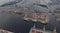 Aerial view of high-tech modern seaport with cranes and loaders