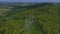 Aerial view. High voltage metal post. High-voltage towers in the forest