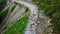 Aerial view of highway blocked by flock of sheeps in manali , himachal pradesh