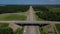 Aerial view of highway cloverleaf interchange seen from above.