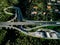 Aerial view of highway, expressway and motorway with a toll payment point in Italy