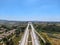 Aerial view of highway, freeway road with vehicle in movement