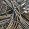 Aerial view of highway and overpass with cars in city. AI generative illustration
