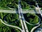 Aerial view of highway and overpass with green woods in Finland