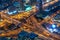 Aerial view of a highway road interchange in Dubai at night, UAE