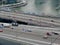 Aerial view of highway road traffic on bridge and vehicle passing