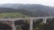Aerial view of the Highway Viaduct on Concrete Pillars in the Mountains