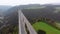 Aerial view of the Highway Viaduct on Concrete Pillars in the Mountains