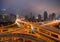 Aerial view of highways in Shanghai Downtown, China. Financial district and business centers in smart city in Asia. Top view of