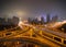 Aerial view of highways in Shanghai Downtown, China. Financial district and business centers in smart city in Asia. Top view of