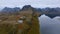 Aerial View from a Hill, Unfolding the Stunning Ocean and Towering Mountain Peaks in Norway