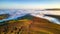 Aerial view of hills rising above a sea of cloud during a temperature inversion (Brecon Beacons