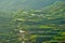 Aerial view of hills in rural covered with fog in the morning