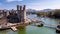 Aerial view of the historic castle Caernafon, Gwynedd in Wales - United Kingdom