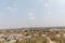 Aerial view of the historic Orchha town surrounded with lush vegetation