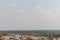 Aerial view of the historic Orchha town surrounded with lush vegetation