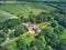 Aerial view of historic Rufford Old Hall and surrounding area