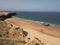 Aerial view of the historic Sagres Fortress on the golden sand beach of Sagres, Portugal