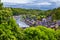 Aerial view of the historic town of Dinan with Rance river with dramatic cloudscape, Cotes-d\'Armor department. Brittany (Bretagne