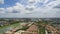 Aerial view of home and house in village of land development out