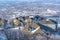 Aerial view of homes on mountain town with panorama view of valley in background