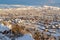 Aerial view of homes in a neighborhood amidst picturesque nature scenery